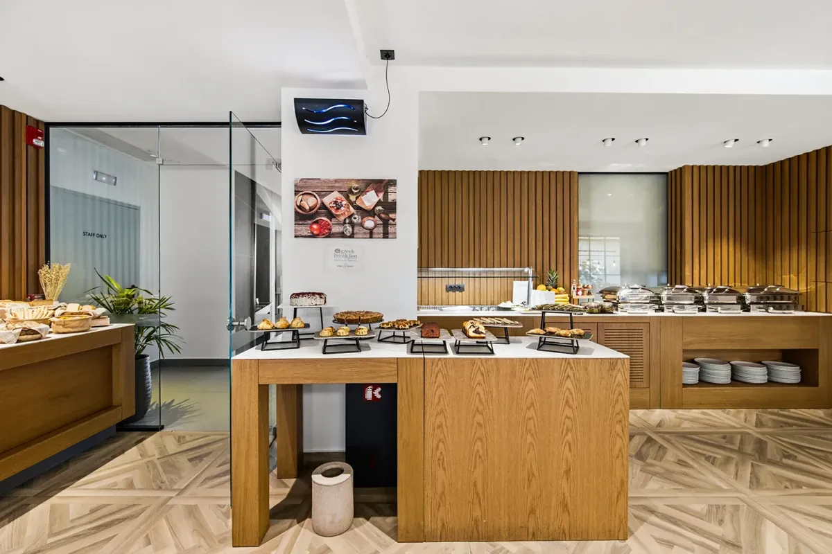 The Greek breakfast buffet, with pastries and cakes on tiered stands